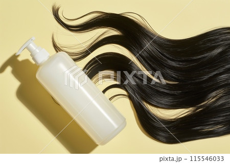 Natural black hair and shampoo bottle on yellow background. Top view. 115546033