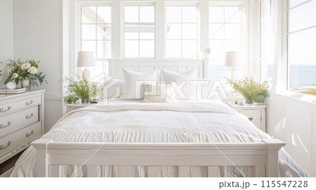 Beautiful interior of luxury bedroom with window sea view. Coastal cottage concept. High quality photo 115547228