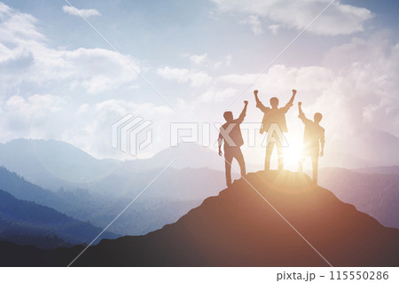 Silhouette of a team celebrating a victory against sunset background, concept of victory and leadership Silhouette of a team celebrating a victory against sunset background, concept of victory and leadership 115550286