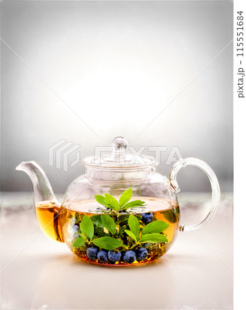 Blueberry leaf tea clear glass teapot small green leaves burgundy red brew vision 115551684