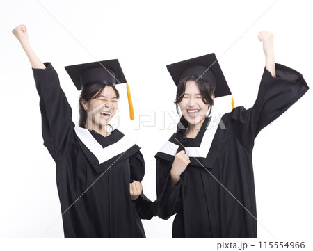 Happy and success girl friend graduates  in cap and gown 115554966