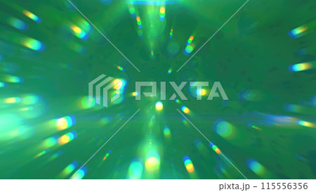 Abstract green glowing background with flying balls and circles of blurred festive bokeh particles Abstract green glowing background with flying balls and circles of blurred festive bokeh particles 115556356