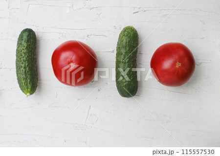 Flat lay of tomatoes and cucumbers. Flat lay of tomatoes and cucumbers. 115557530