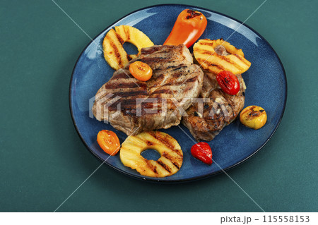 Grilled meat steak with pineapple. Grilled meat steak with pineapple. 115558153