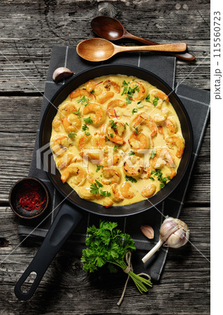 Sauteed Shrimp in creamy saffron sauce, top view Sauteed Shrimp in creamy saffron sauce, top view 115560723