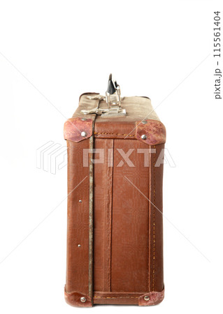 Vintage brown suitcase isolated on white background Vintage brown suitcase isolated on white background 115561404
