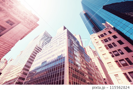 Manhattan cityscape, color toning applied, New York City, USA. Manhattan cityscape, color toning applied, New York City, USA. 115562824