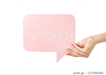 Hand holding an pink empty speech bubble isolated on white background 115566566