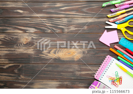 Back to school concept on brown wooden background. Top view Back to school concept on brown wooden background. Top view 115566673