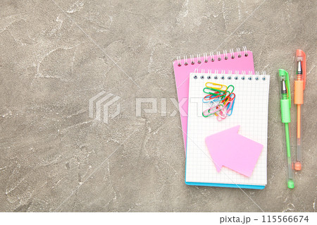 Back to school concept on grey concrete background. Top view 115566674