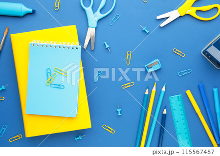 School supplies on blue background. Back to school. Flat lay. 115567487