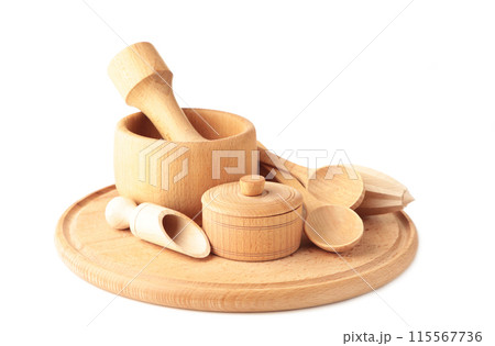 Collection of wooden kitchen utensils isolated on white background. Collection of wooden kitchen utensils isolated on white background. 115567736