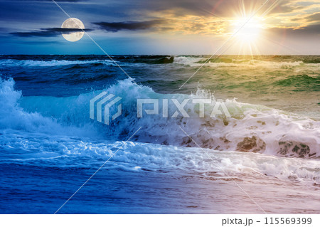 dramatic seascape at summer solstice. waves crashing the shore beneath a sky with sun and moon above horizon. day and night time change concept dramatic seascape at summer solstice. waves crashing the shore beneath a sky with sun and moon above horizon. day and night time change concept 115569399