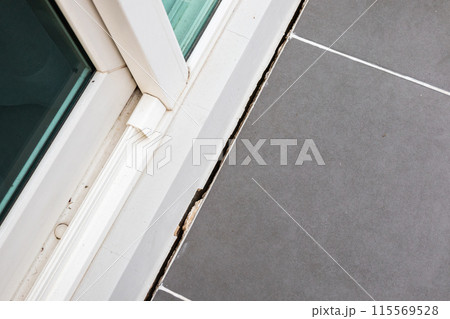 cracked concrete floor of the house 115569528