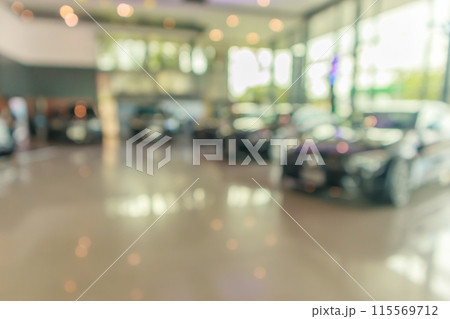 new cars in showroom interior blurred abstract background 115569712