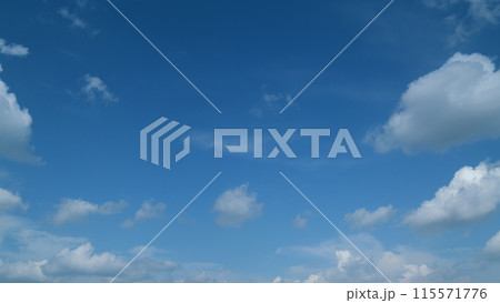 Delicate cirrus and cumulus on different layers clouds in september sky. Natural background texture taken on sunny day. Timelapse. Delicate cirrus and cumulus on different layers clouds in september sky. Natural background texture taken on sunny day. Timelapse. 115571776