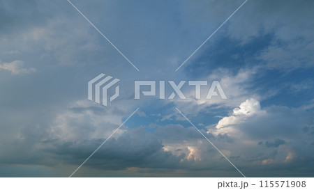 Beautiful rainy dark storm clouds. Rainy sky. Magic dramatic sky in rainy weather. Timelapse. 115571908