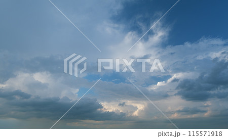 Black moving storm clouds thunderstorms on horizon. Thunderstorm in tropical summer with scary and moody sky. Timelapse. Black moving storm clouds thunderstorms on horizon. Thunderstorm in tropical summer with scary and moody sky. Timelapse. 115571918