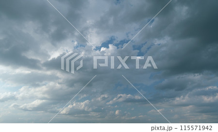 Beautiful blue sky with stratocumulus and clouds background. Sky with clouds weather nature cloud blue. Timelapse. 115571942