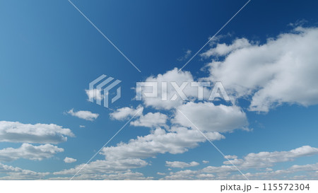 Cloud cloudscape. Puffy fluffy white clouds. Nature weather blue sky. Timelapse. Cloud cloudscape. Puffy fluffy white clouds. Nature weather blue sky. Timelapse. 115572304