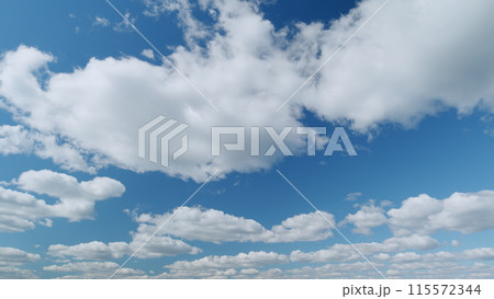 White and blue colors sky with stratus and stratocumulus clouds. Weather was very hot in the evening. Tropical summer sunlight. Timelapse. White and blue colors sky with stratus and stratocumulus clouds. Weather was very hot in the evening. Tropical summer sunlight. Timelapse. 115572344