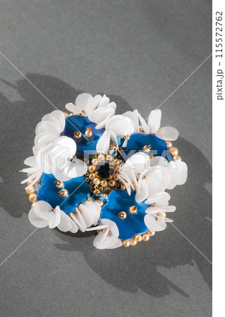 Handmade brooch with mother-of-pearl blue buttons and white sequins Handmade brooch with mother-of-pearl blue buttons and white sequins 115572762