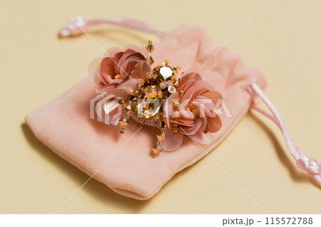 handmade brooch in the shape of a beetle on a plush bag handmade brooch in the shape of a beetle on a plush bag 115572788