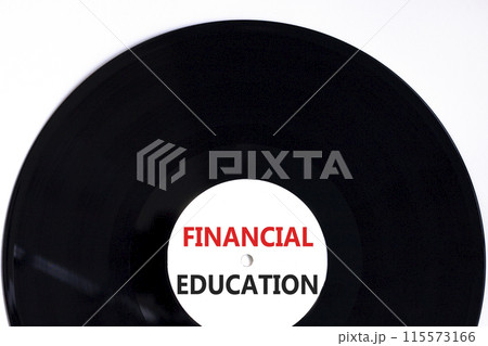 Financial education symbol. Concept words Financial education on beautiful white black vinyl disk. Beautiful white paper background. Business Financial education concept. Copy space. 115573166