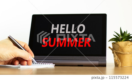 Hello summer symbol. Concept words Hello summer on beautiful black pad. Beautiful white background. Businessman hand. Business lifestyle Hello summer concept. Copy space. Hello summer symbol. Concept words Hello summer on beautiful black pad. Beautiful white background. Businessman hand. Business lifestyle Hello summer concept. Copy space. 115573224