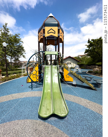 Colorful children playground activities in community public park  115573411