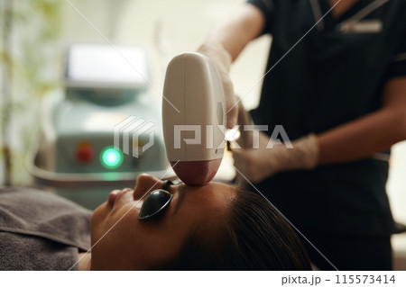 Woman Getting Hair Removed Woman Getting Hair Removed 115573414