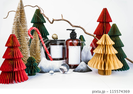 dark jar with lid and dispenser on the background of Christmas decorations, side view dark jar with lid and dispenser on the background of Christmas decorations, side view 115574369