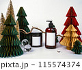 dark jar with lid and dispenser on the background of Christmas decorations, side view 115574374