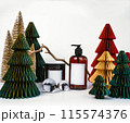 dark jar with lid and dispenser on the background of Christmas decorations, side view 115574376