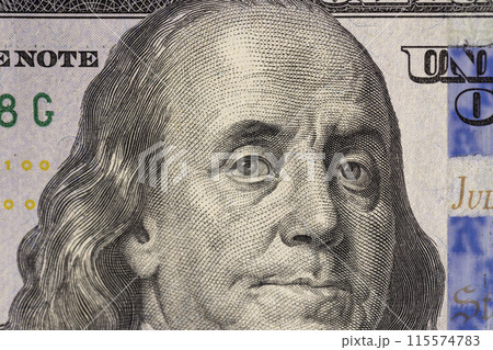 a close-up of a hundred US dollars of a new sample 115574783