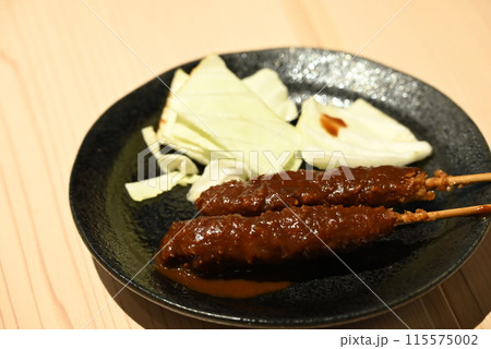 味噌ダレのたっぷりかかった串カツ 115575002