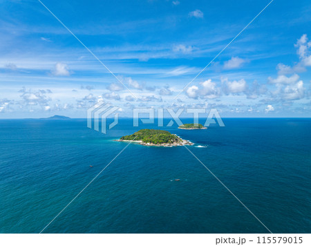 Aerial view of a blue sea surface water texture background,Sun reflections over ocean, Aerial flying drone view Waves water surface texture on sunny tropical ocean in Phuket island Thailand Aerial view of a blue sea surface water texture background,Sun reflections over ocean, Aerial flying drone view Waves water surface texture on sunny tropical ocean in Phuket island Thailand 115579015