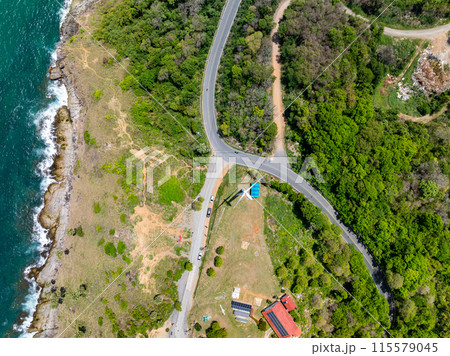 Amazing landscape view seashore and curve road on mountains, Aerial view of Tropical sea in the beautiful Phuket island Thailand, Travel and business tour website background concept Amazing landscape view seashore and curve road on mountains, Aerial view of Tropical sea in the beautiful Phuket island Thailand, Travel and business tour website background concept 115579045