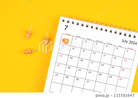 July 2024 Monthly desk calendar for 2024 year with wooden pin. 115581647