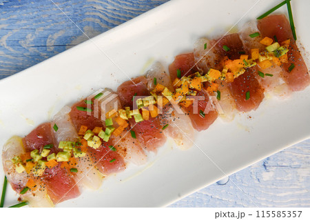 FISH CEVICHE RECIPE, SEA BREAM AND TUNA, AVOCADO, BELL PEPPER, CHILLI, CHIVES, LEMON, OLIVE OIL 115585357