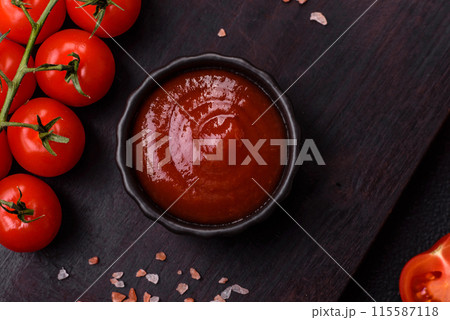 Delicious spicy tomato sauce with pepper, garlic, salt, spices and herbs Delicious spicy tomato sauce with pepper, garlic, salt, spices and herbs 115587118