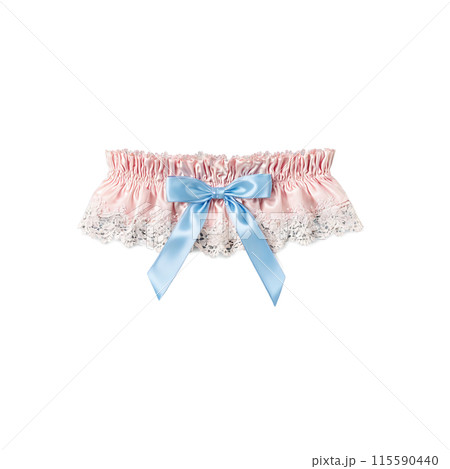Romantic blush pink garter with floral lace and a tiny blue bow soft focus floating 115590440