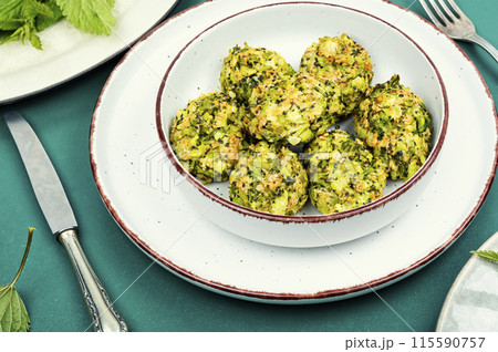 Green veggie nettles cutlets. 115590757