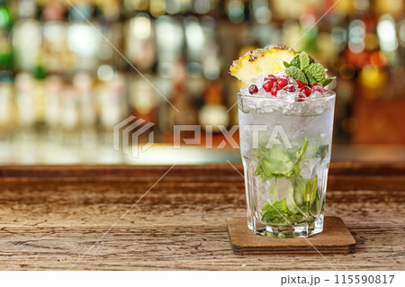 Cocktail with ice, place for text 115590817