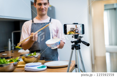 The chef is broadcasting live from workshop how to prepare a spicy glass noodle salad 115591559