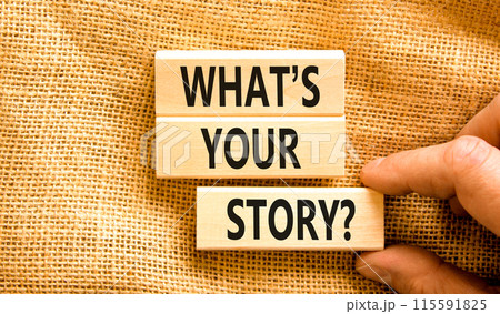 Storytelling and what is your story symbol. Concept words What is your story on blocks. Beautiful canvas background. Businessman hand. Business storytelling and what is your story concept. Copy space. 115591825