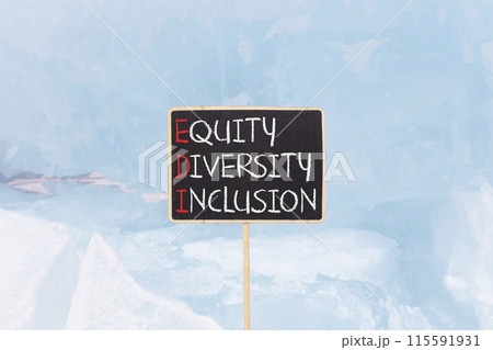 EDI equity diversity inclusion symbol. Concept words EDI equity diversity inclusion on yellow blackboard. Beautiful blue ice background. Business EDI equity diversity inclusion concept. Copy space. EDI equity diversity inclusion symbol. Concept words EDI equity diversity inclusion on yellow blackboard. Beautiful blue ice background. Business EDI equity diversity inclusion concept. Copy space. 115591931