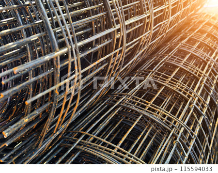 Metal bars arranged stack at the construction site 115594033