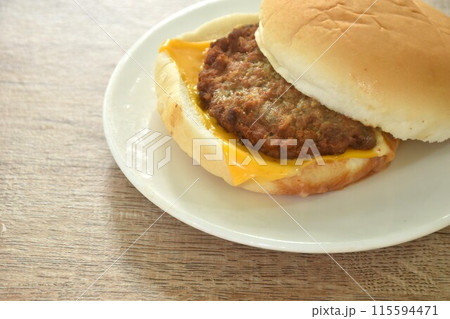 fried mashed beef cheese hamburger stuffed mayonnaise sauce with ketchup on plate fried mashed beef cheese hamburger stuffed mayonnaise sauce with ketchup on plate 115594471