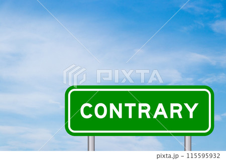 Green color transportation sign with word contrary on blue sky with white cloud background Green color transportation sign with word contrary on blue sky with white cloud background 115595932